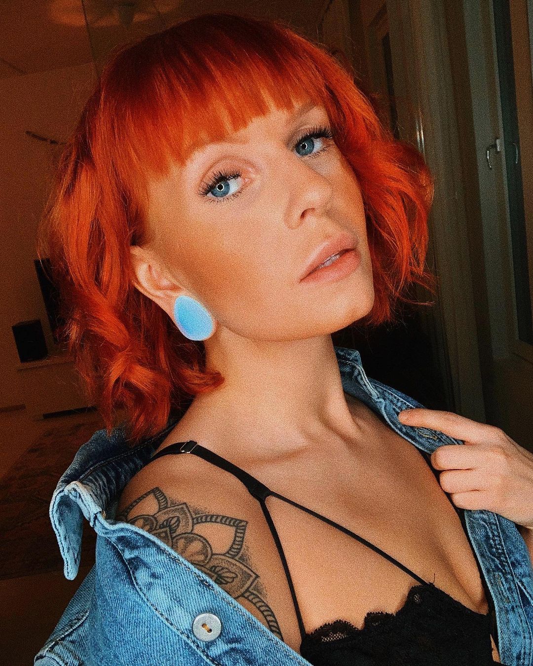 Women wearing large Teardrop Opalite Glass Plug / Gauge