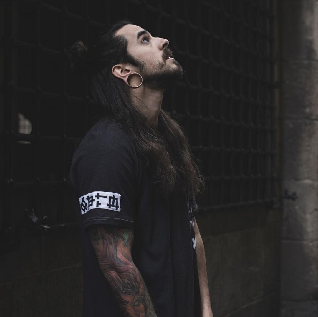Man wearing emo  Rose Gold Double Flare Stainless Steel Tunnel