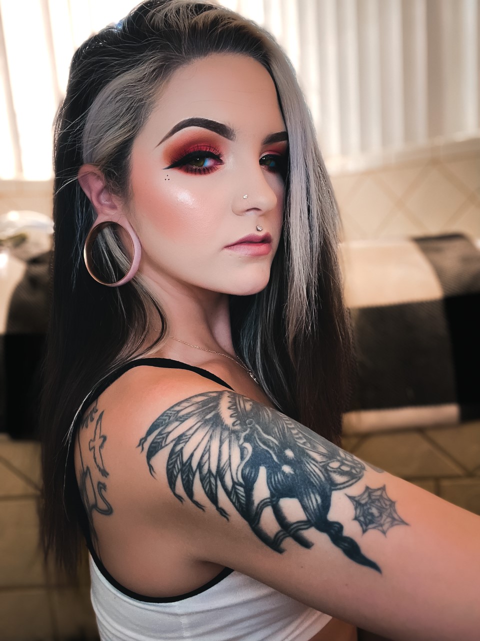 Women wearing large Rose Gold Double Flare Stainless Steel Tunnel