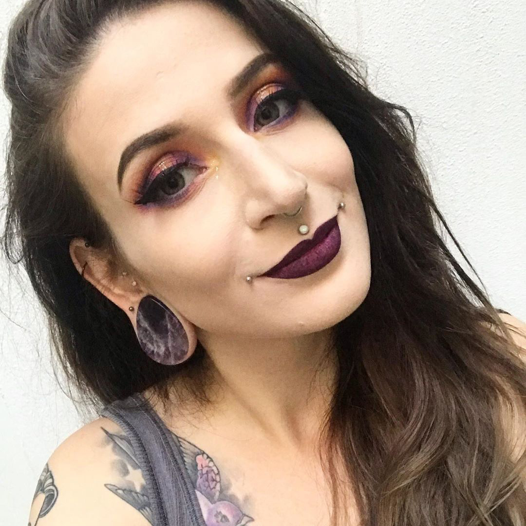Girl wearing nice  Teardrop Amethyst Stone Plug / Gauge