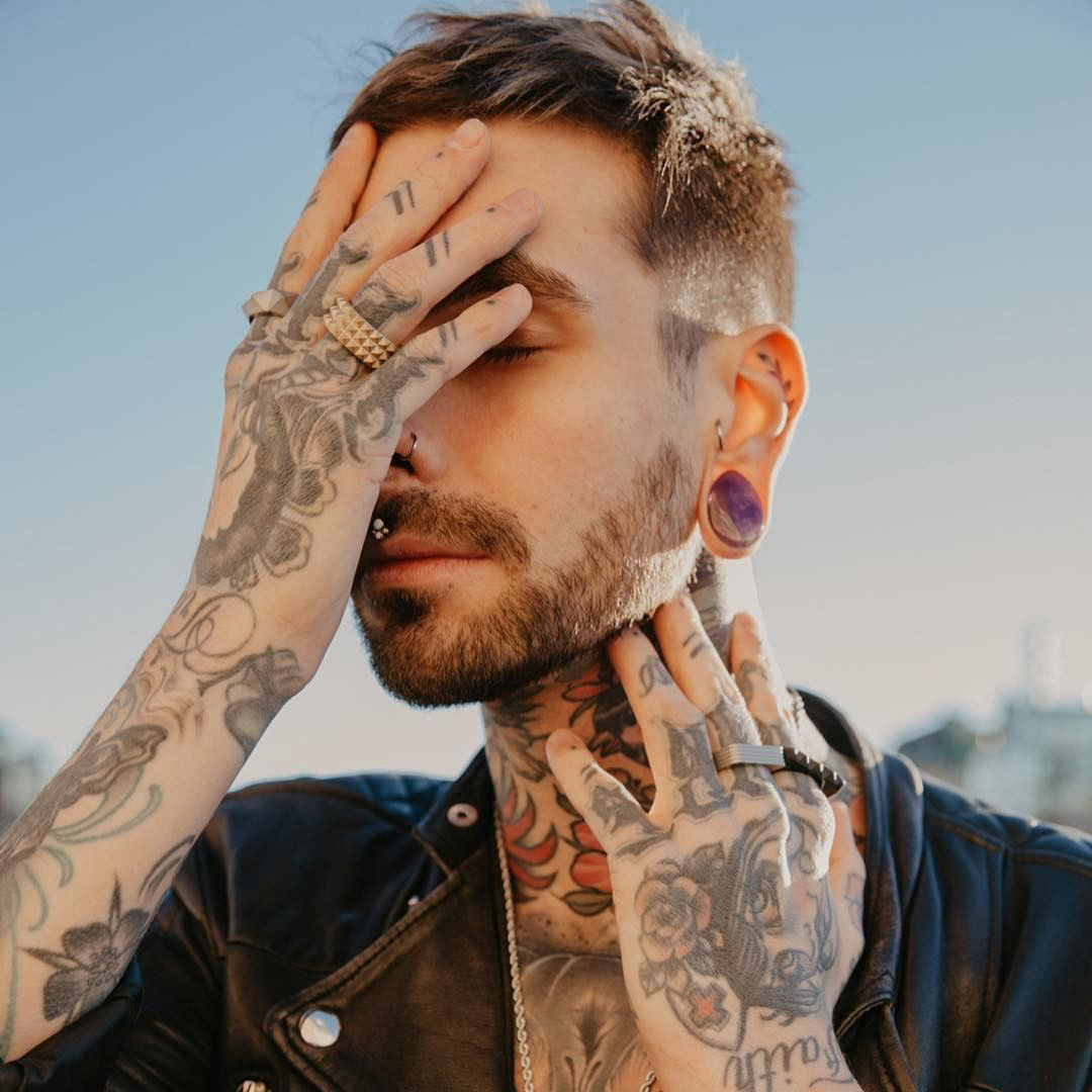 Guy wearing cool  Teardrop Amethyst Stone Plug / Gauge