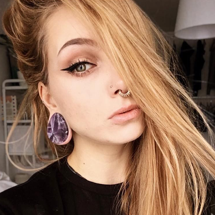Girl wearing unique  Teardrop Amethyst Stone Plug / Gauge