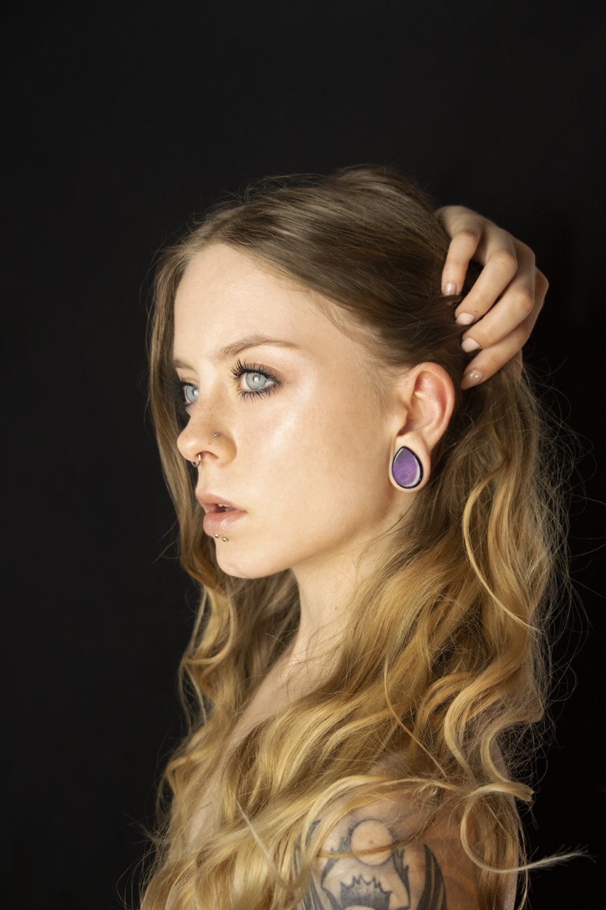 Female wearing cool  Teardrop Amethyst Stone Plug / Gauge