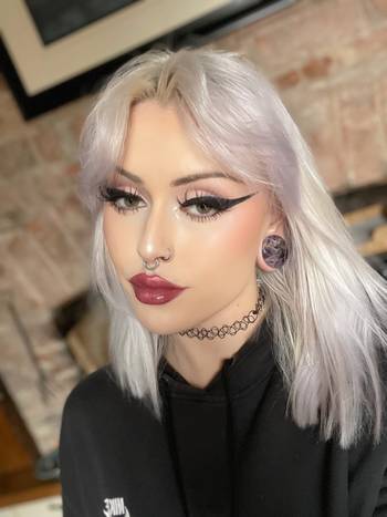 Women wearing large Amethyst Stone Plug / Gauge