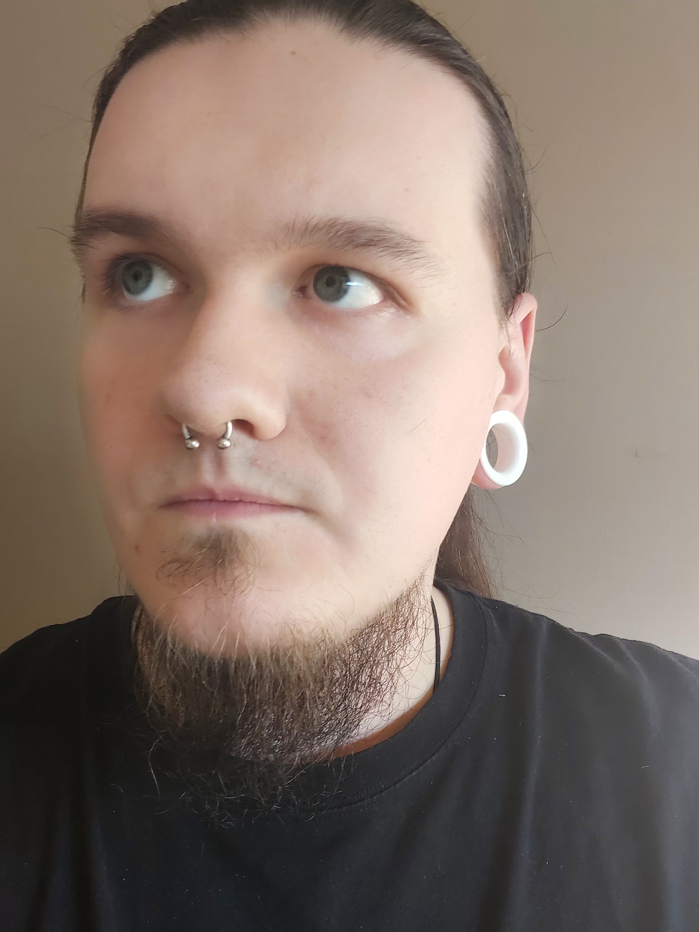 Male wearing big  White Silicone Ear Tunnel