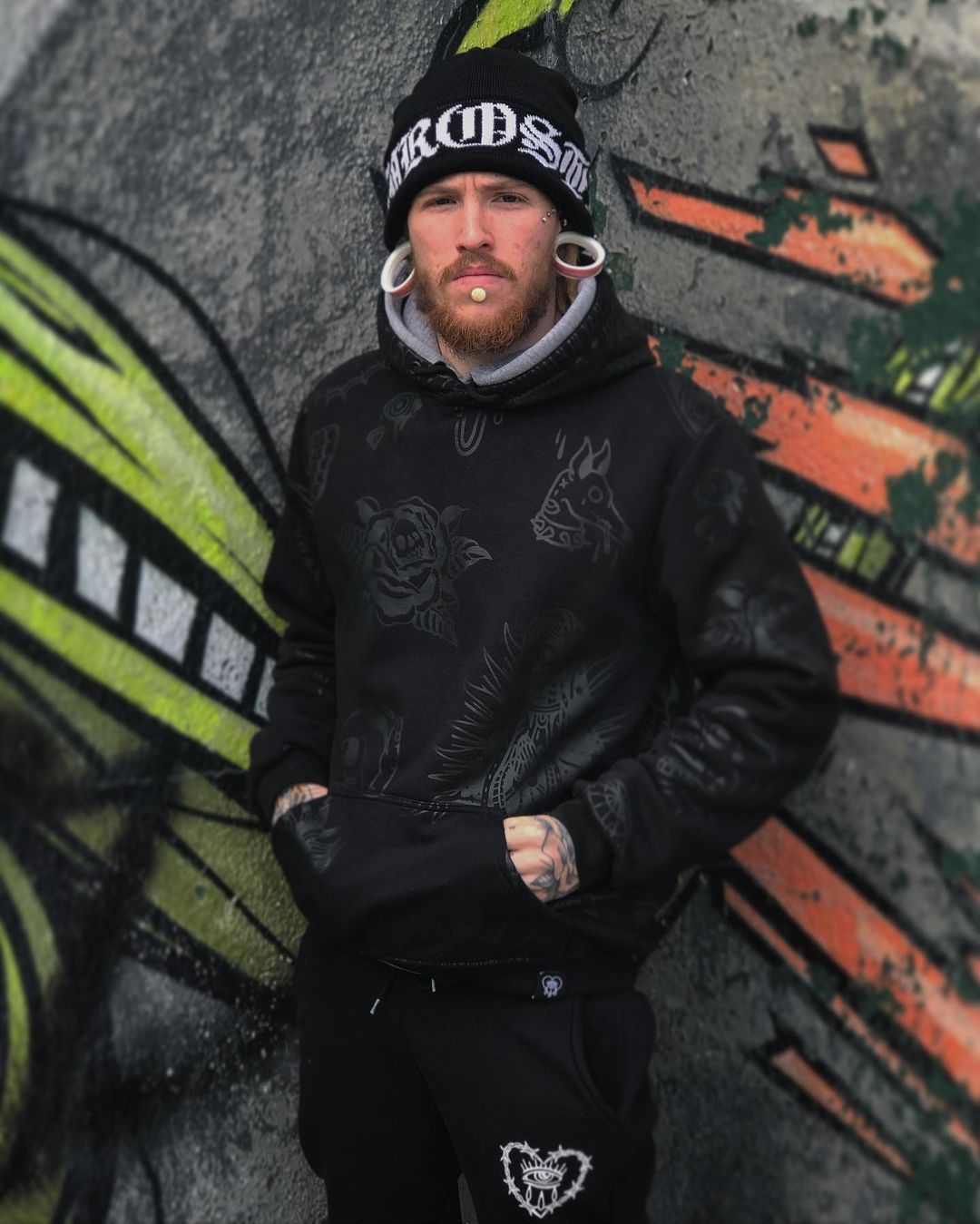 Male wearing large White Silicone Ear Tunnel