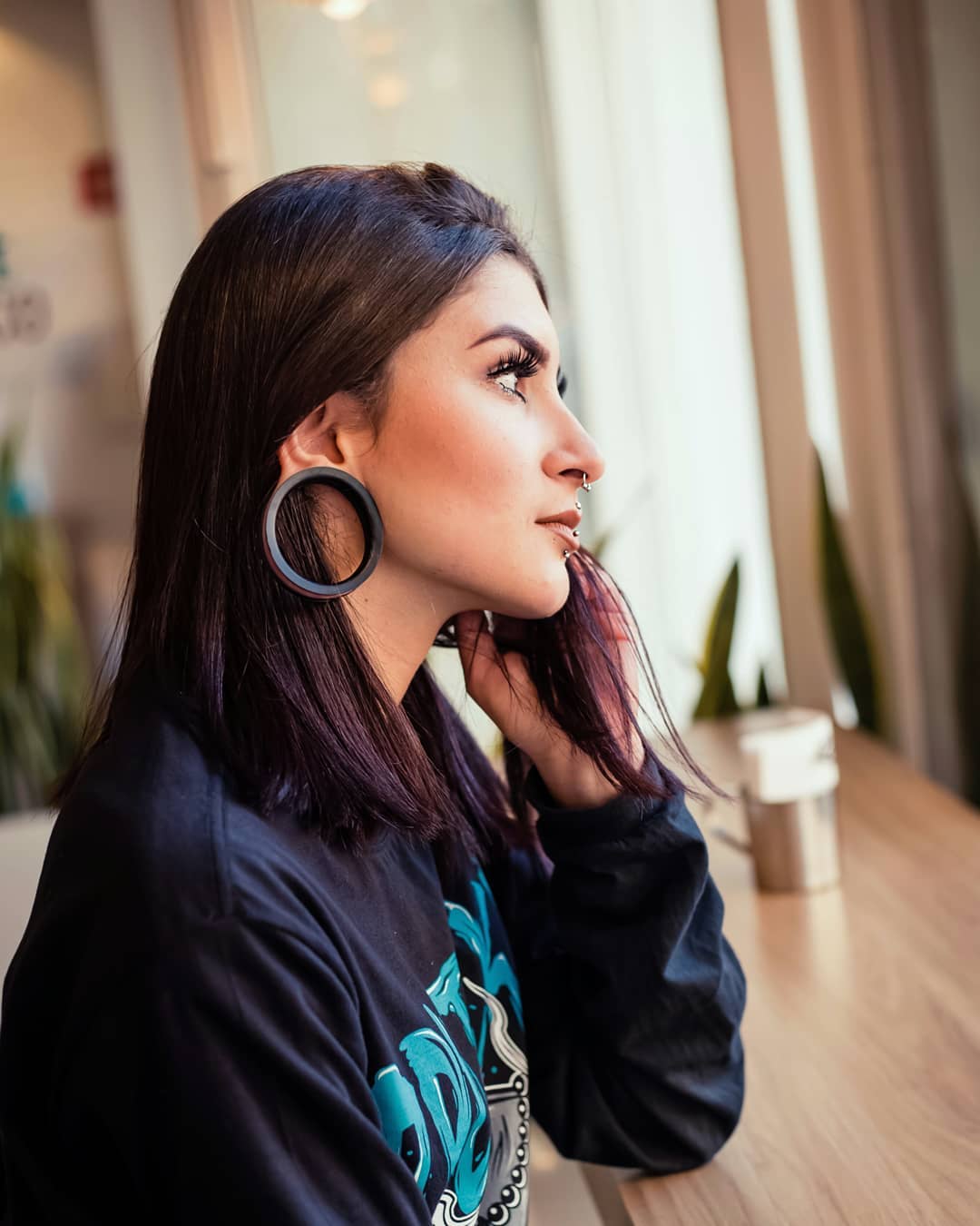 Women wearing large Black Silicone Ear Tunnel