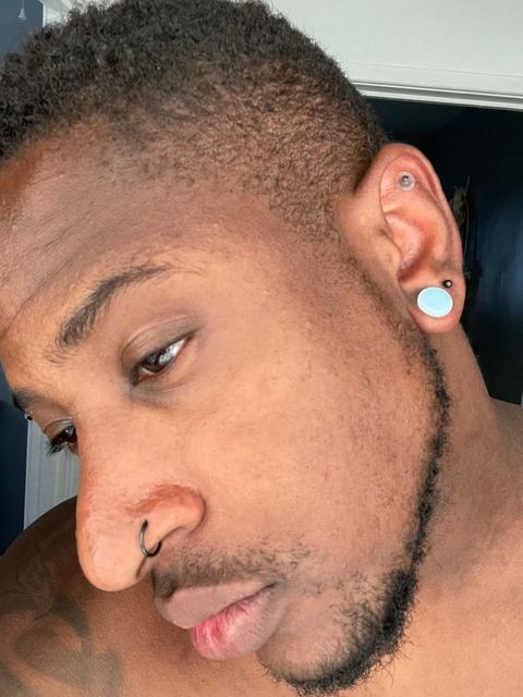 Boy wearing small  Opalite Glass Plug / Gauge