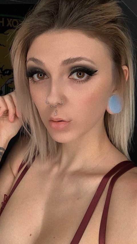 Women wearing bright  Opalite Glass Plug / Gauge