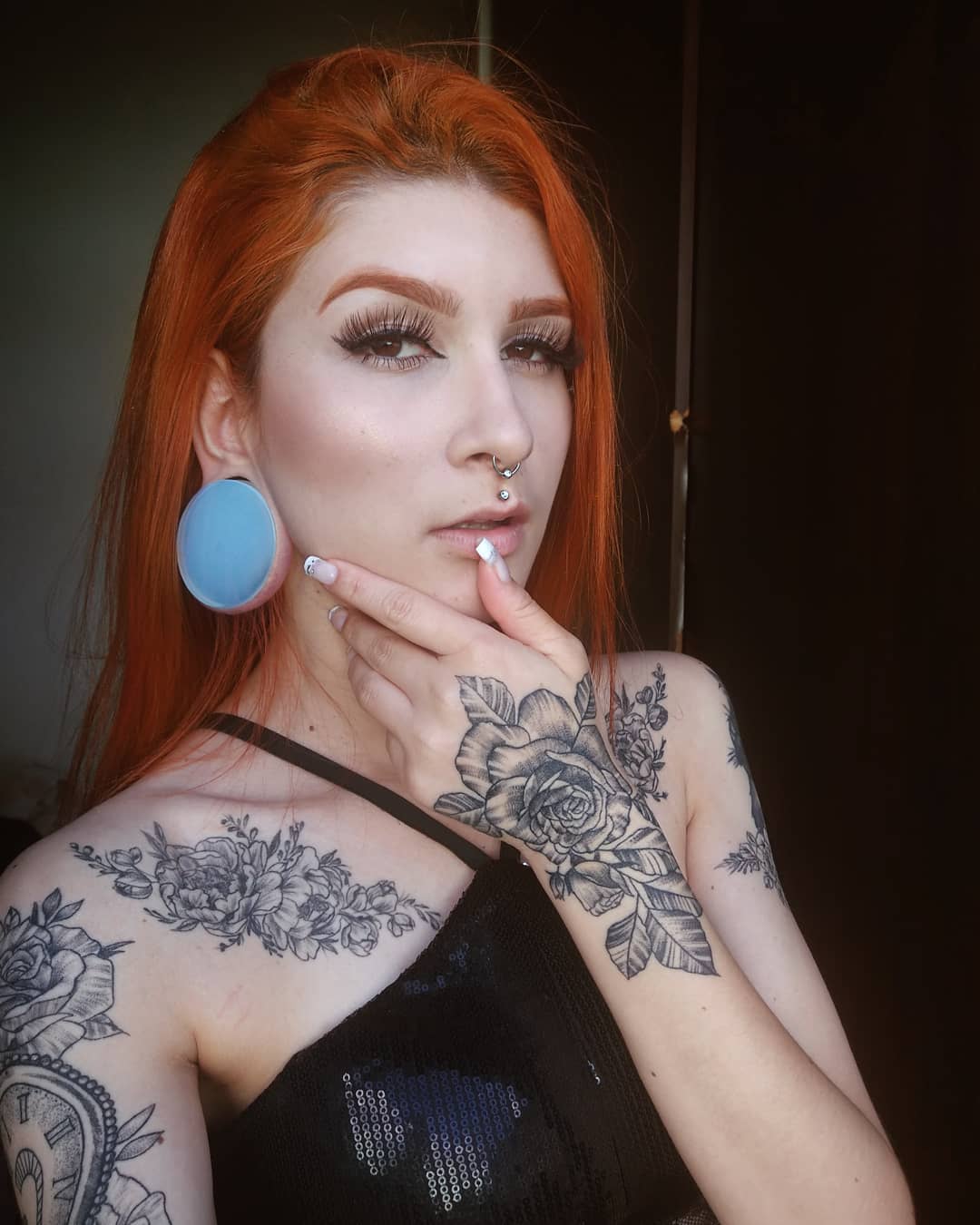 Women wearing large  Opalite Glass Plug / Gauge