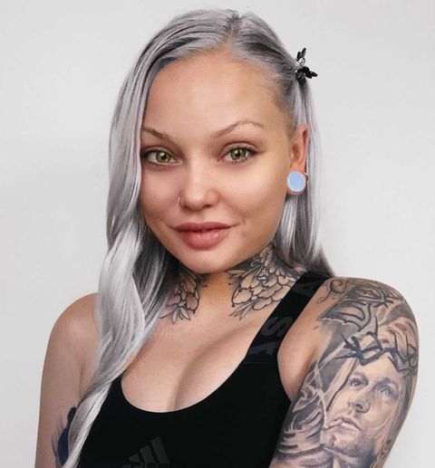 Women wearing big  Opalite Glass Plug / Gauge