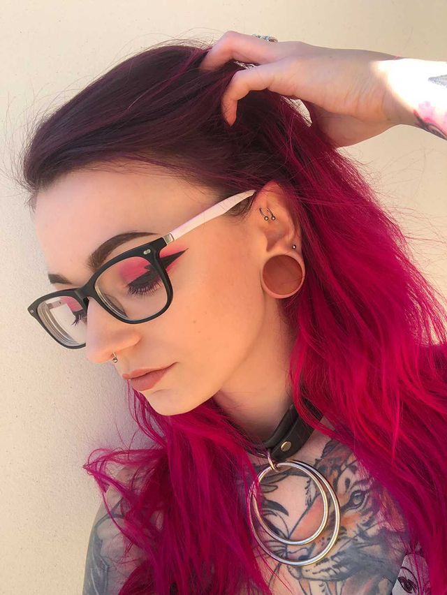 girl wearing big  Brown Saba Convex Wood Ear Plug / Gauge