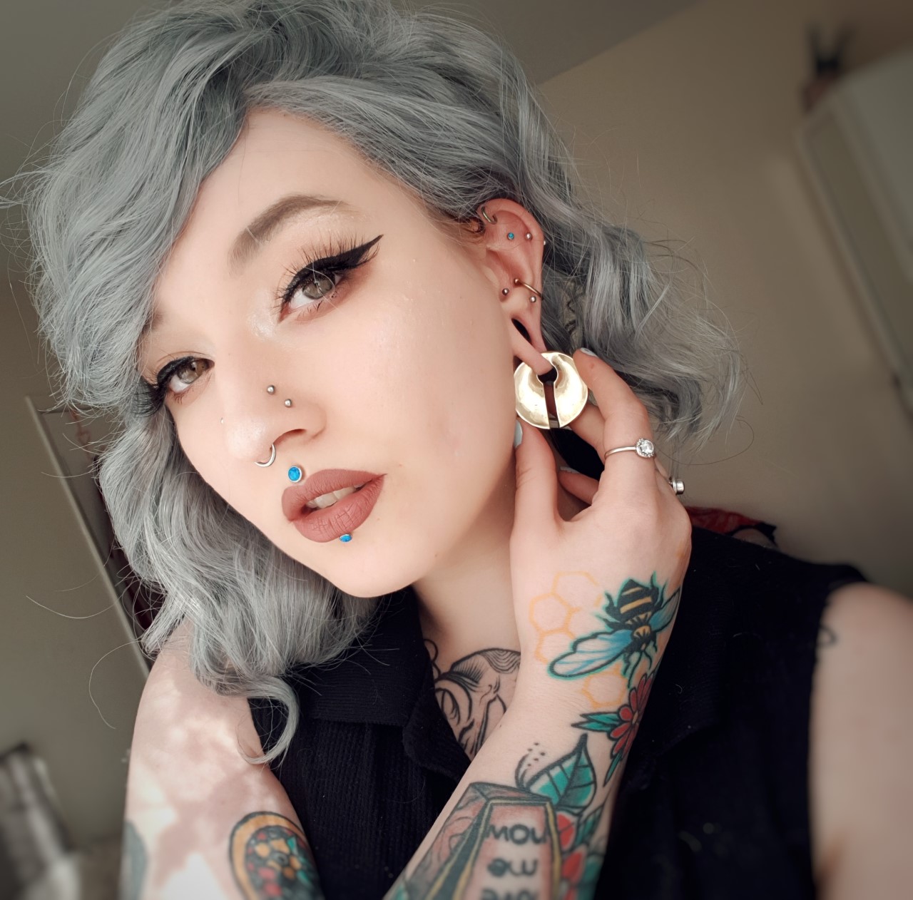 Girl wearing cute Circle Keyhole - Brass Ear Weights (Pair)