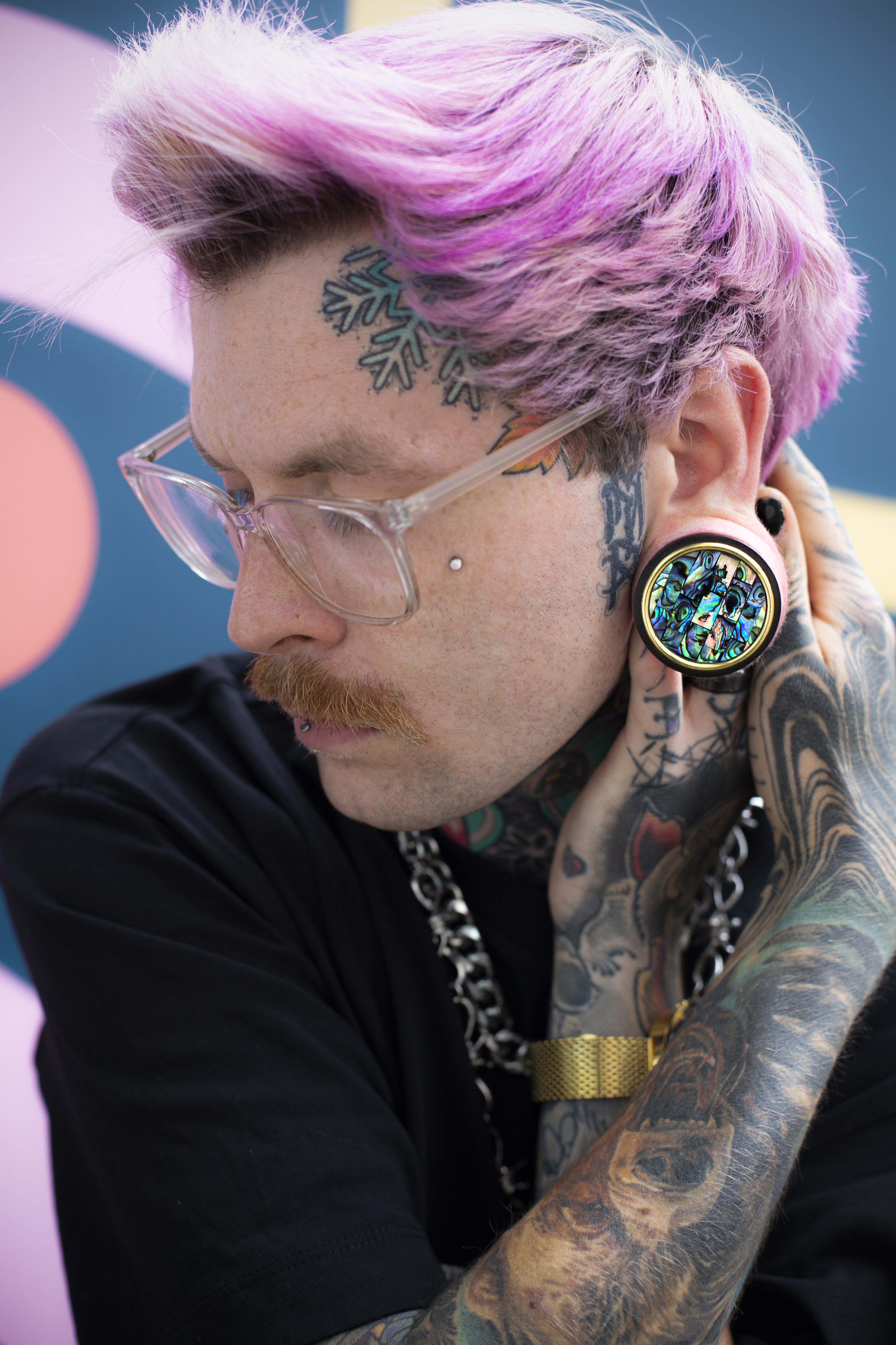 Male wearing cool  Gold Mosaic Abalone Wood Ear Plug / Gauge