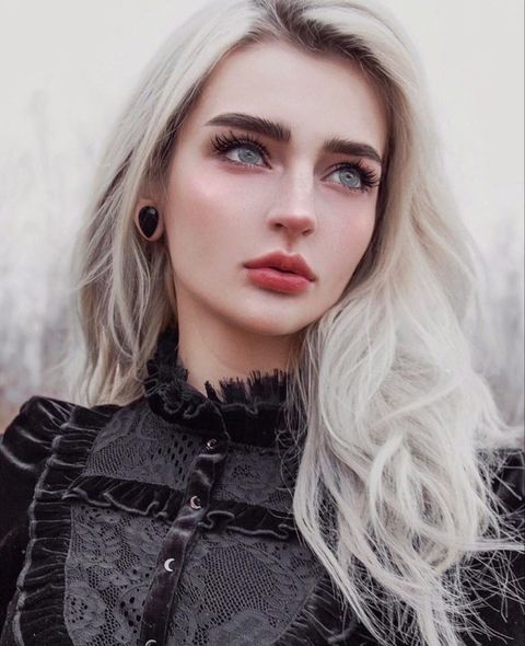 girl wearing pretty  Black Faceted Obsidian Teardrop Glass Plug / Gauge