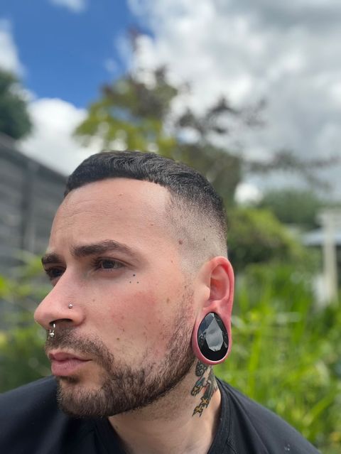 guy wearing cool  Black Faceted Obsidian Teardrop Glass Plug / Gauge
