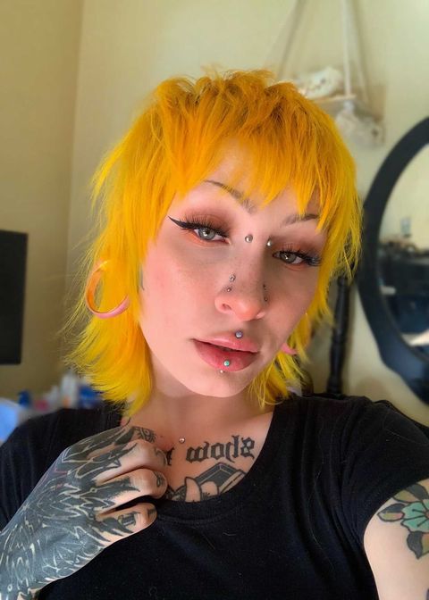 Girl wearing unique  Gold Double Flare Stainless Steel Tunnel