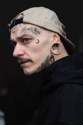 Male wearing large Gold Stainless Steel Double Flared Tunnel