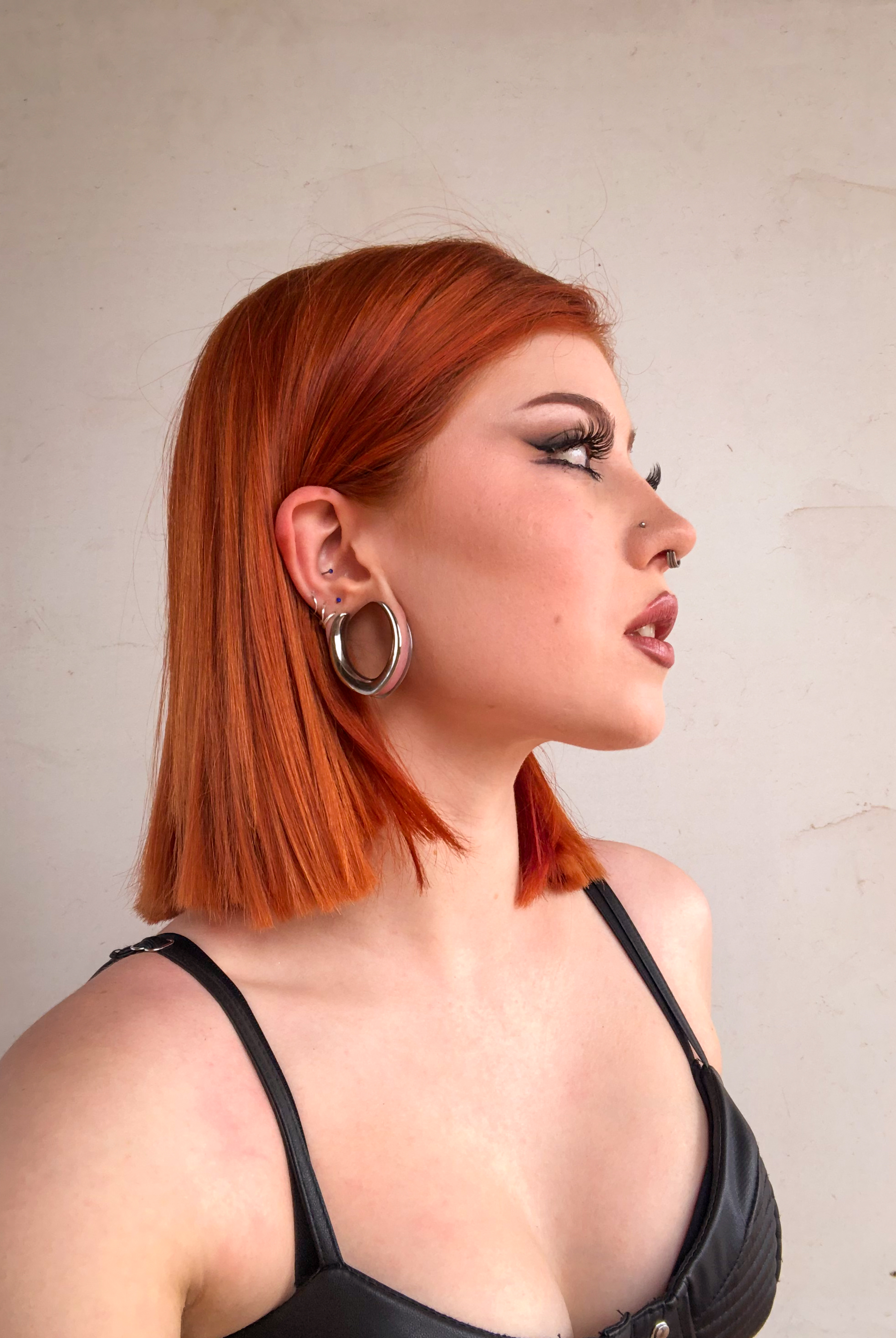 Women wearing large Silver V Saddle Metal Ear Gauge / Plug