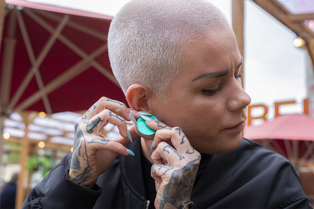 Girl wearing cute Solid Mint Green Silicone Earring Plugs / Gauge