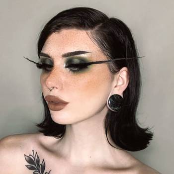 Girl wearing pretty Green Eye Jasper Stone Plug / Gauge
