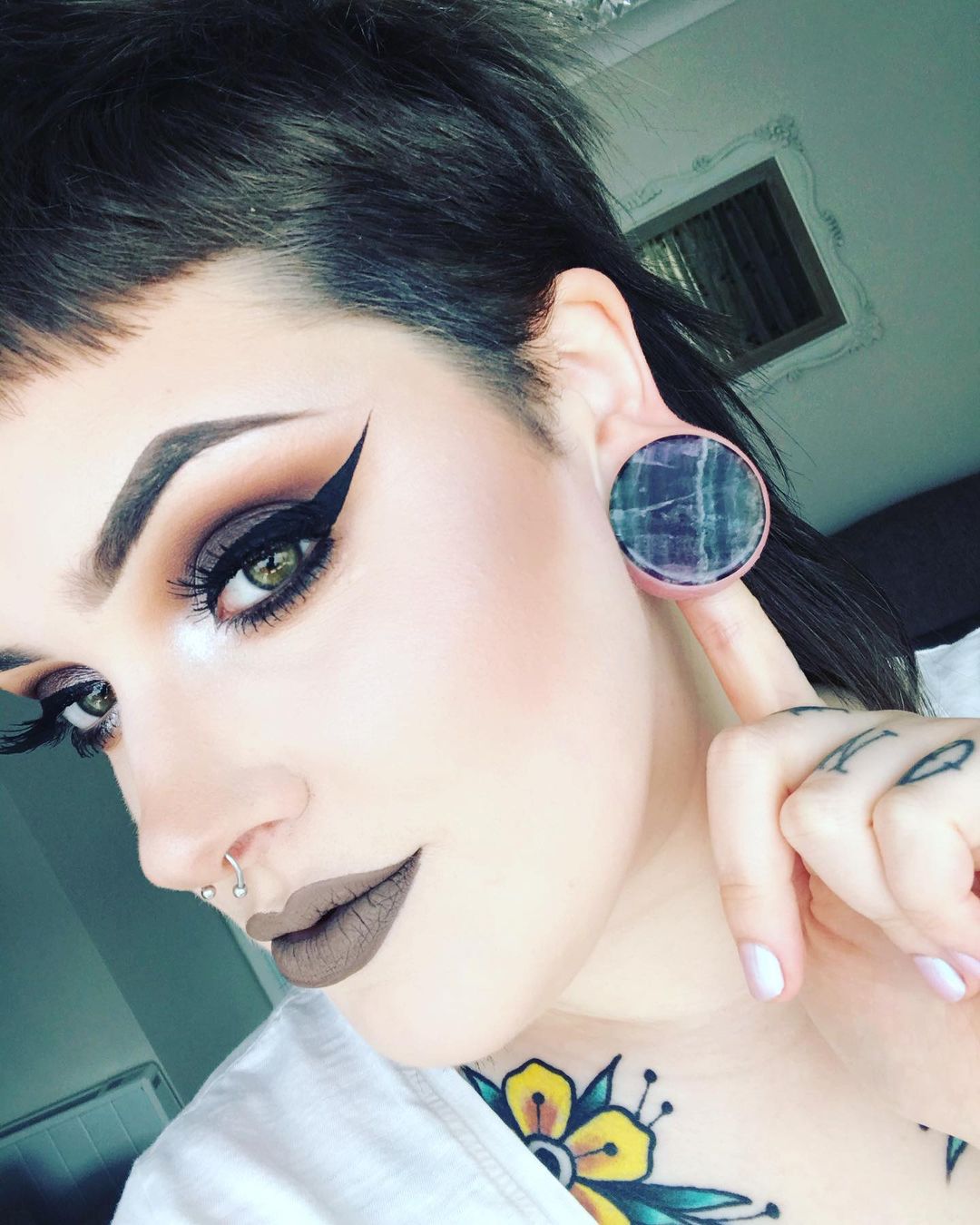 Women wearing big Rainbow Fluorite Stone Plug / Gauge