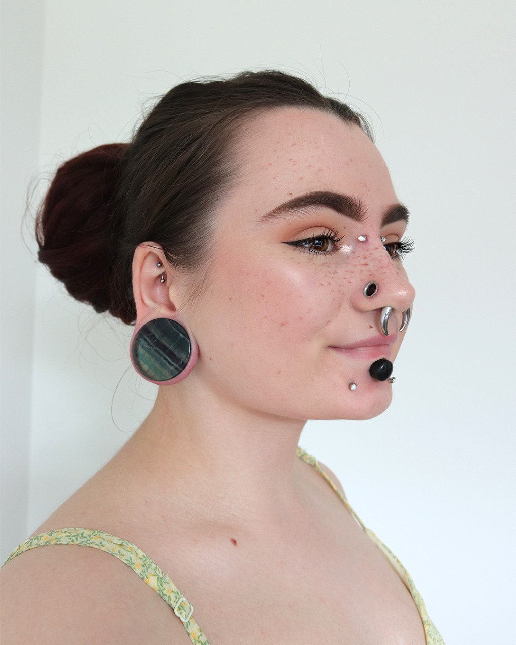 Women wearing large  Rainbow Fluorite Stone Plug / Gauge