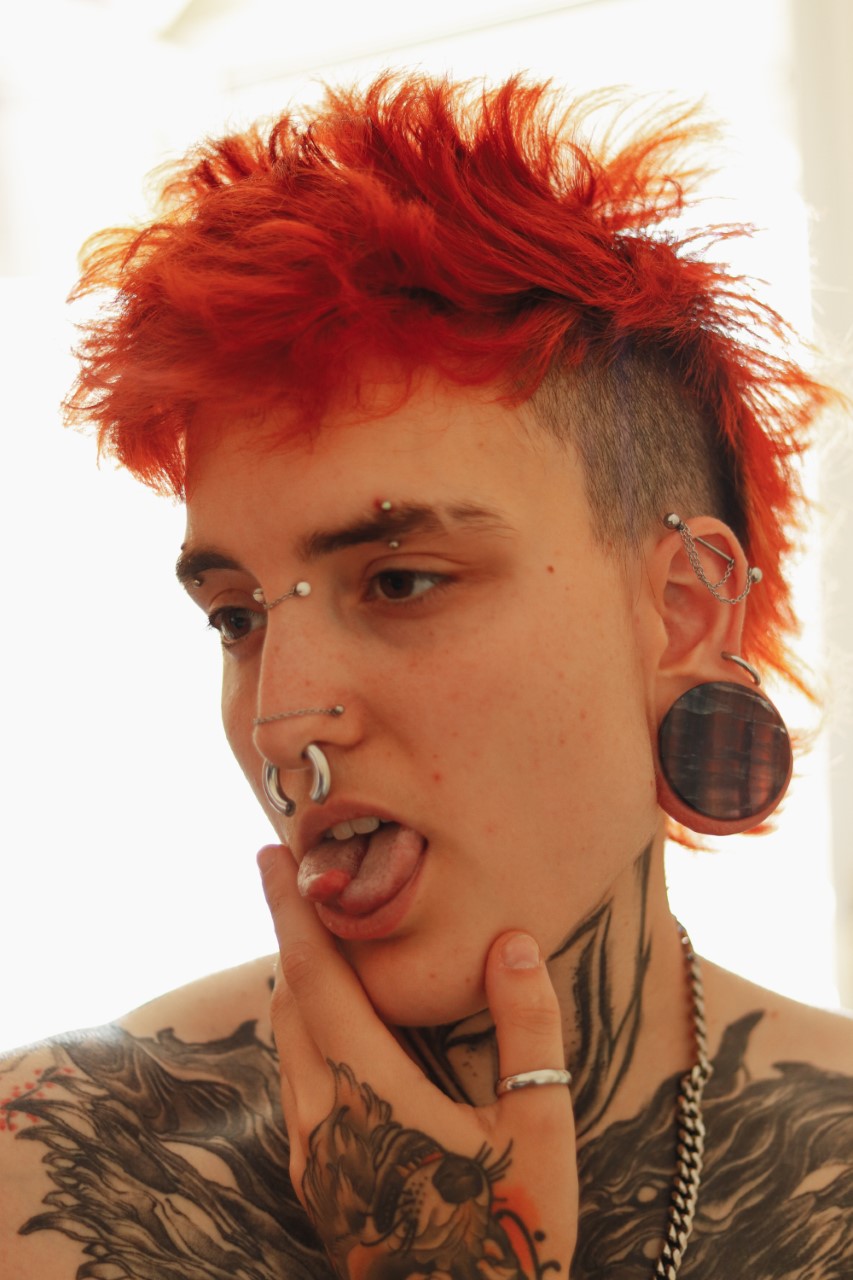 guy wearing big  Rainbow Fluorite Stone Plug / Gauge