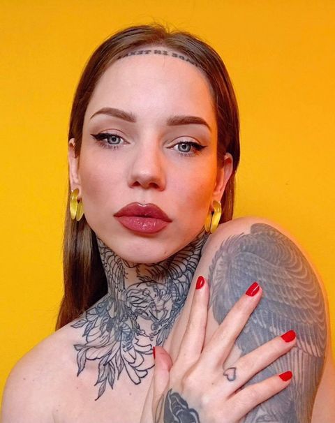 Tattooed woman wearing  Yellow Glass - Pincer Keyhole Ear Weights (Pair)