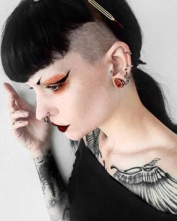 Girl wearing pretty Hammered Silver Steel Keyhole Ear Weights - Pair