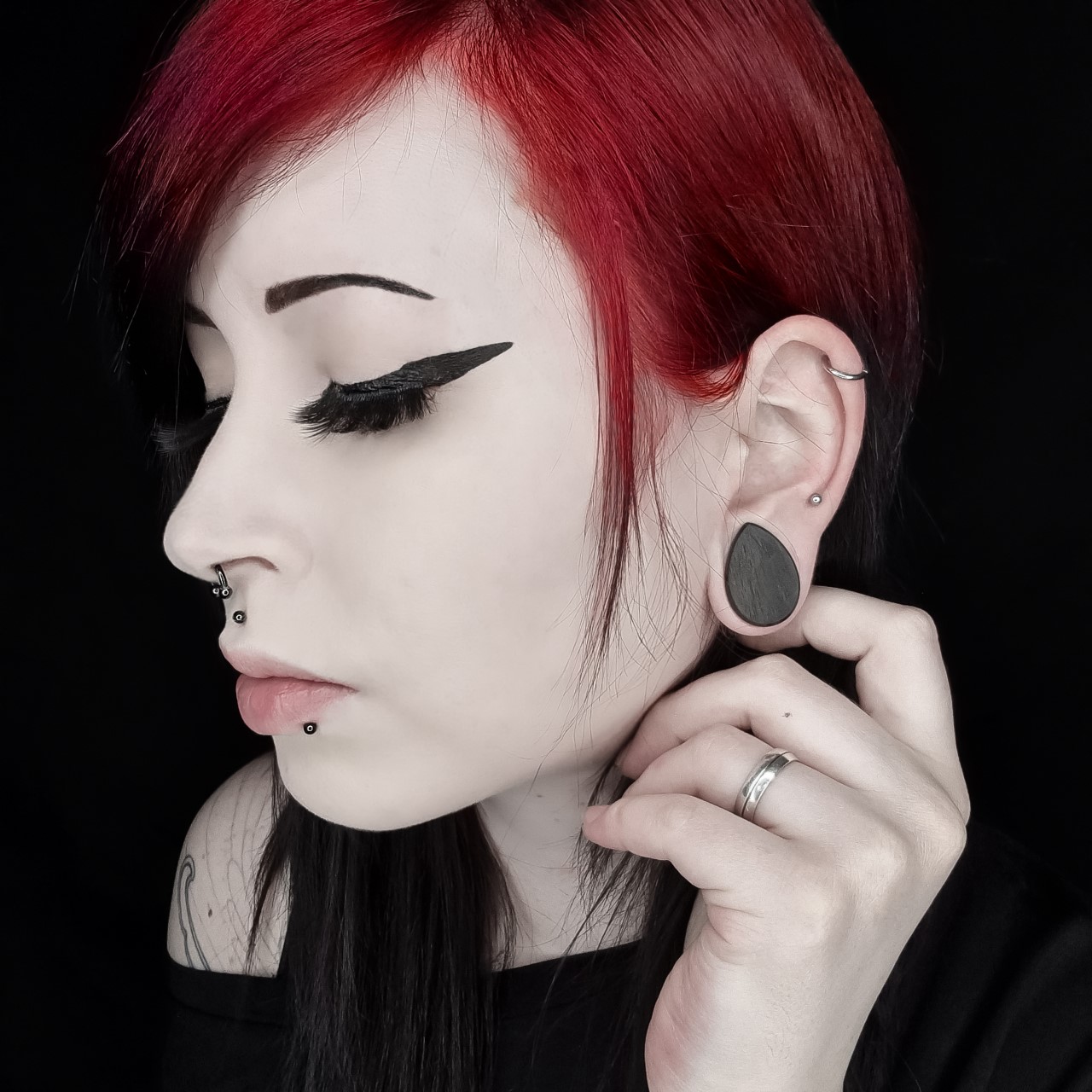 Women wearing large Black Ebony Teardrop Wood Ear Plug / Gauge