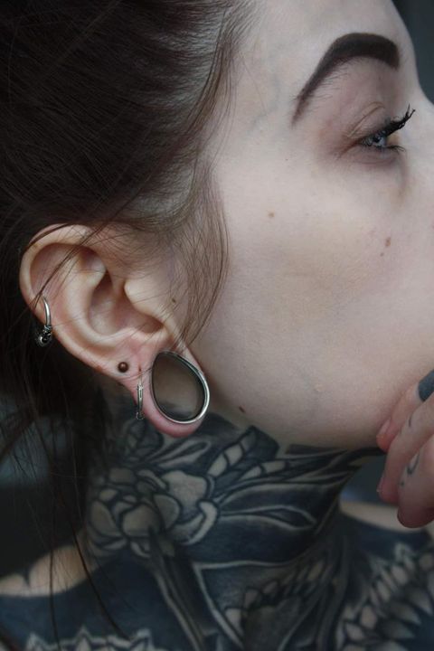 Girl wearing big  Silver Steel Teardrop Tunnel / Plug / Gauge