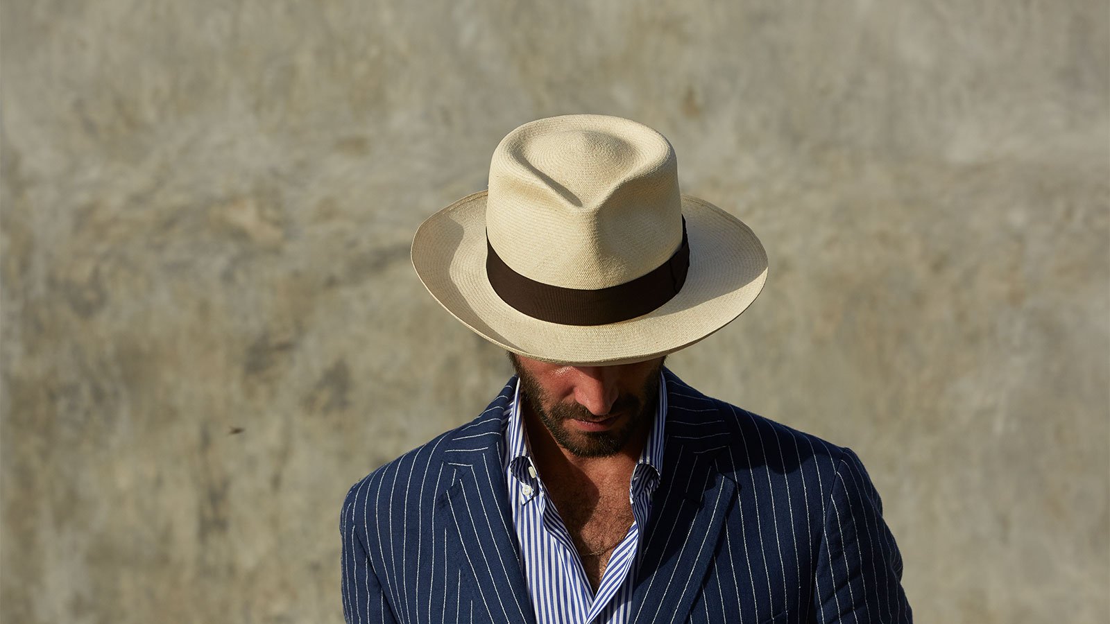 Design
Rarer than a perfect diamond and infinitely more refined, we are proud to carry the most exquisitely crafted Montecristi Panama hats in the world. Depending on the quality of the weave, a Worth & Worth Montecristi Panama Hat can take several months to weave by our master weavers in Ecuador. Available in four different qualities, the result is a hat with a soft texture, translucent appearance, and luminous ivory color.
Material
This Montecristi Panama straw is handwoven in Ecuador available in 4 different qualities: Artisan, Master, Museum, and Superfino and handcrafted in our NY atelier. 
Specifications
Our Montecristi Barbados Sand combines a 4 teardrop crown and  3” brim with 100% weathered organic sand cotton Hatband juxtapositioned with a Kick.  Handwoven by our master weavers in Ecuador.Handcrafted in New York. Truly a work of art.
