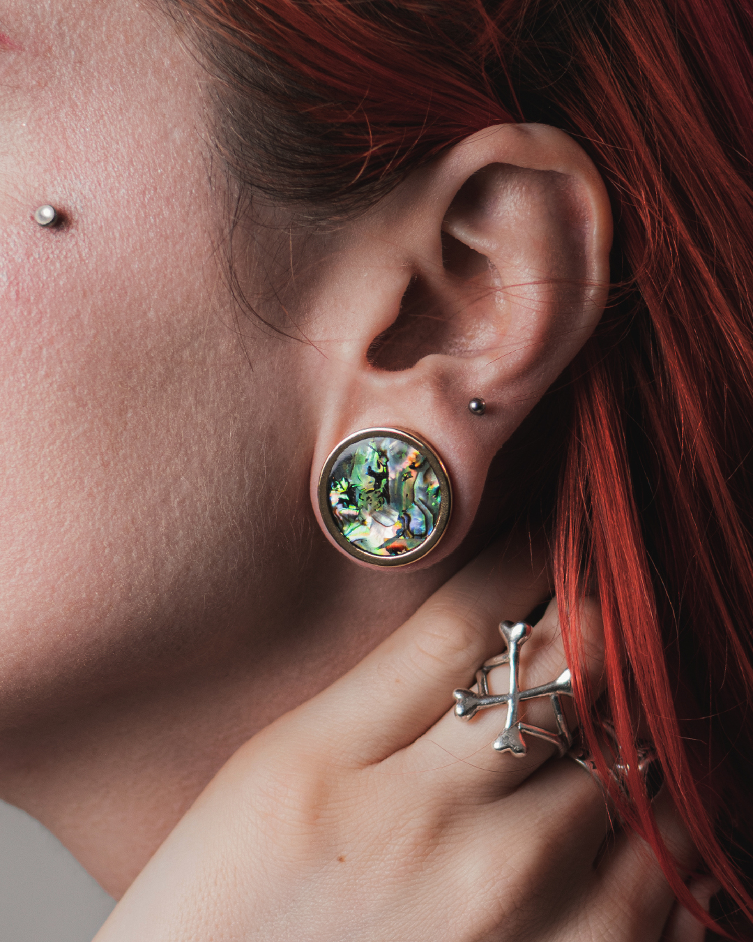 Female wearing cool  Abalone Inlay Heavy Brass Metal Ear Gauge / Plug