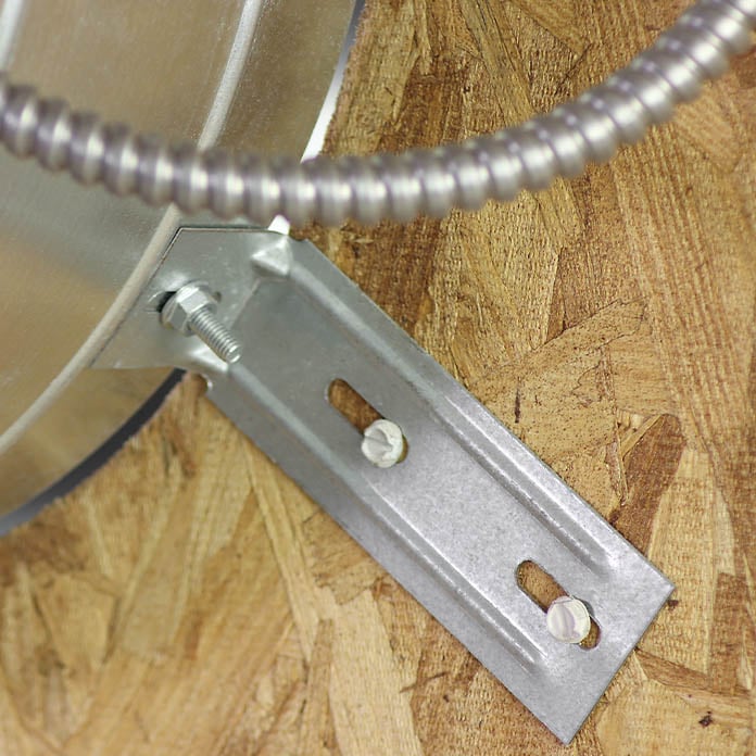 Close-up of a bracket installed on the fan at a gable end of the attic.