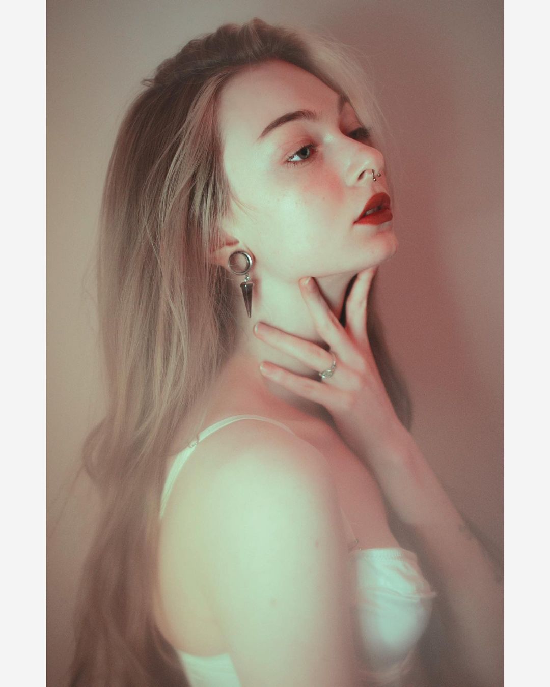 Girl wearing handmade  Amethyst & Silver Dangle Plug