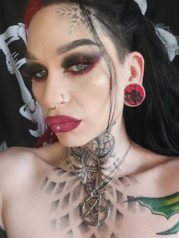 Girl wearing cute  Marble Black & Red Stone Plug / Gauge