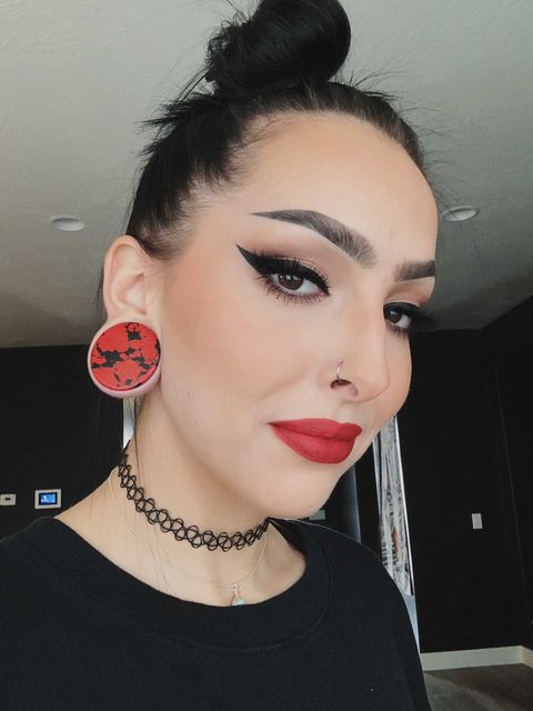Women wearing large  Marble Black & Red Stone Plug / Gauge