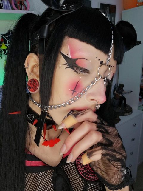 Girl wearing emo  Marble Black & Red Stone Plug / Gauge