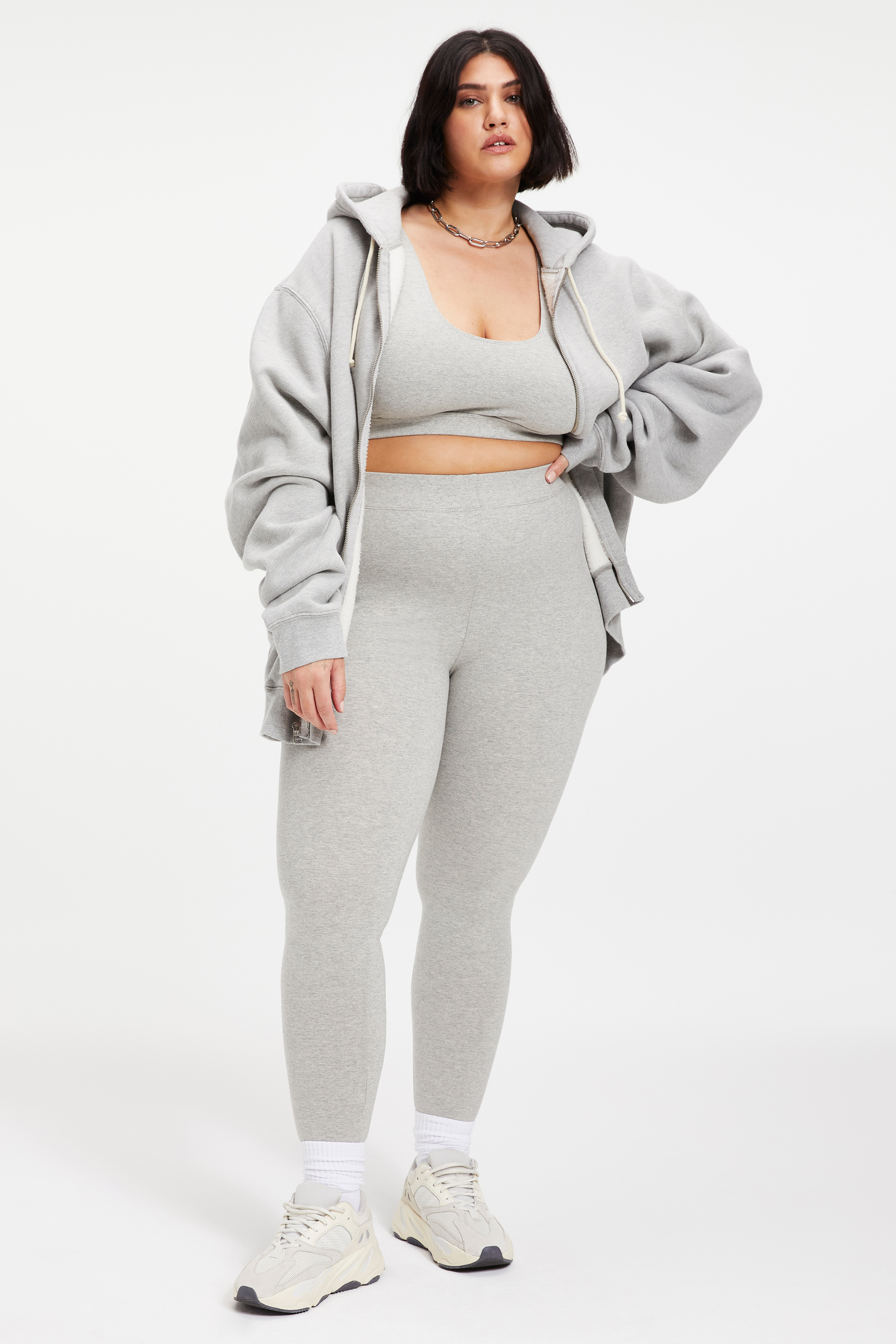 BOYFRIEND ZIP HOODIE in HEATHER GREY001 styled with our ESSENTIAL SCOOP BRA in HEATHER GREY001, or ESSENTIAL LEGGING in HEATHER GREY001