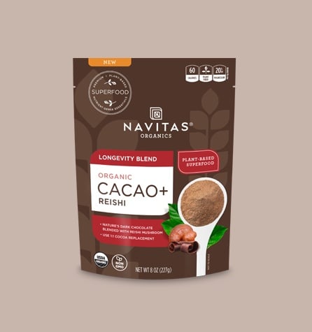 An unopened bag of Navitas Organics Cacao+ Longevity Blend