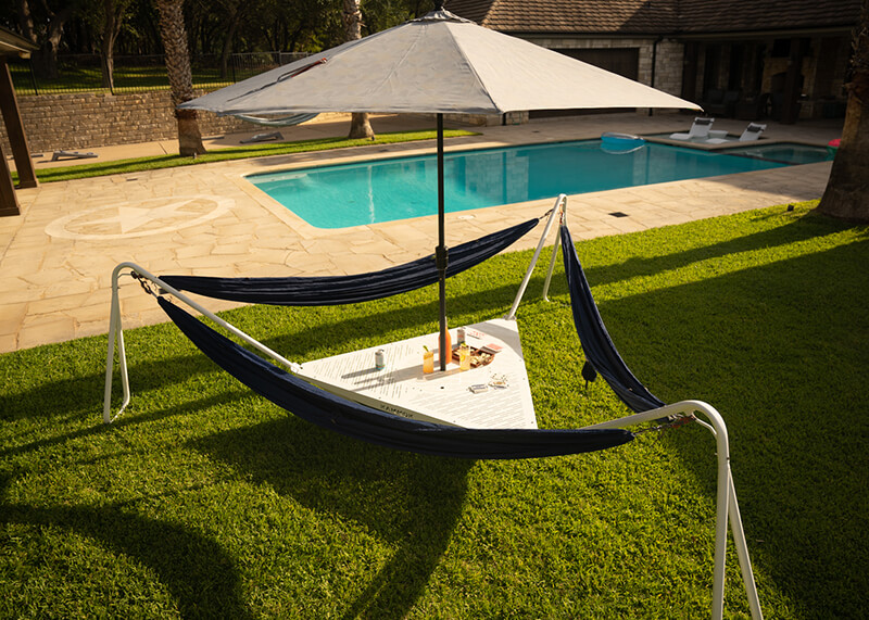 The lightest, portable hammock stand to hang from park-to-patio.