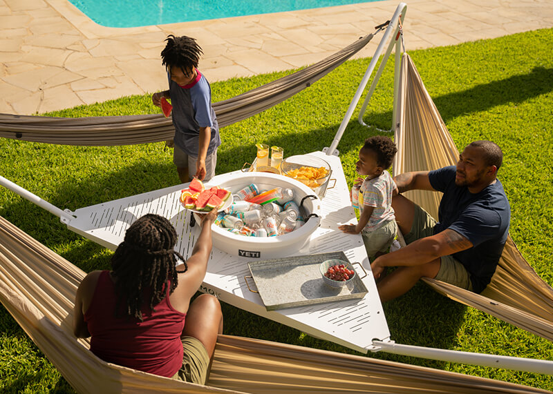The lightest, portable hammock stand to hang from park-to-patio.