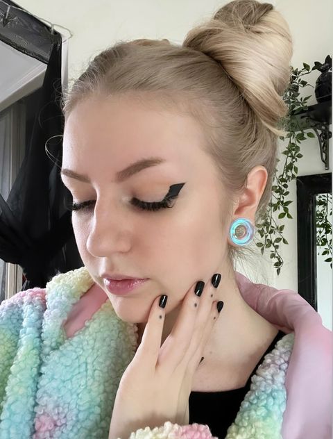 Girl wearing pretty  Blue & Green Iridescent Glass Ear Tunnel