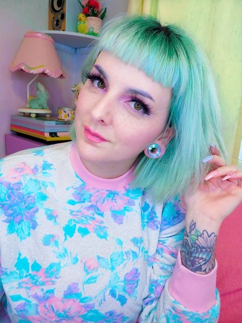 girl wearing classy  Blue & Green Iridescent Glass Ear Tunnel