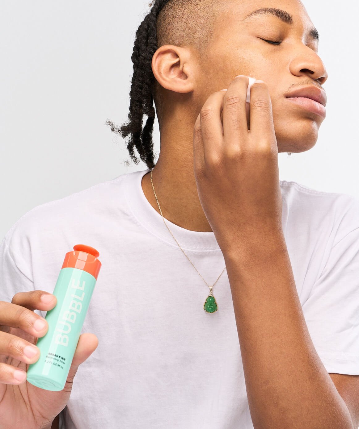 Man applying everyday natural toner for normal to oily skin. 