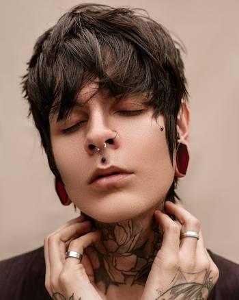 Guy wearing cool Red Coffin Plug / Gauge