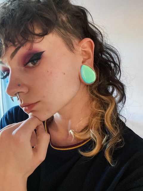 Female wearing beautiful  Blue & Green Iridescent Teardrop  Glass Plug / Gauge