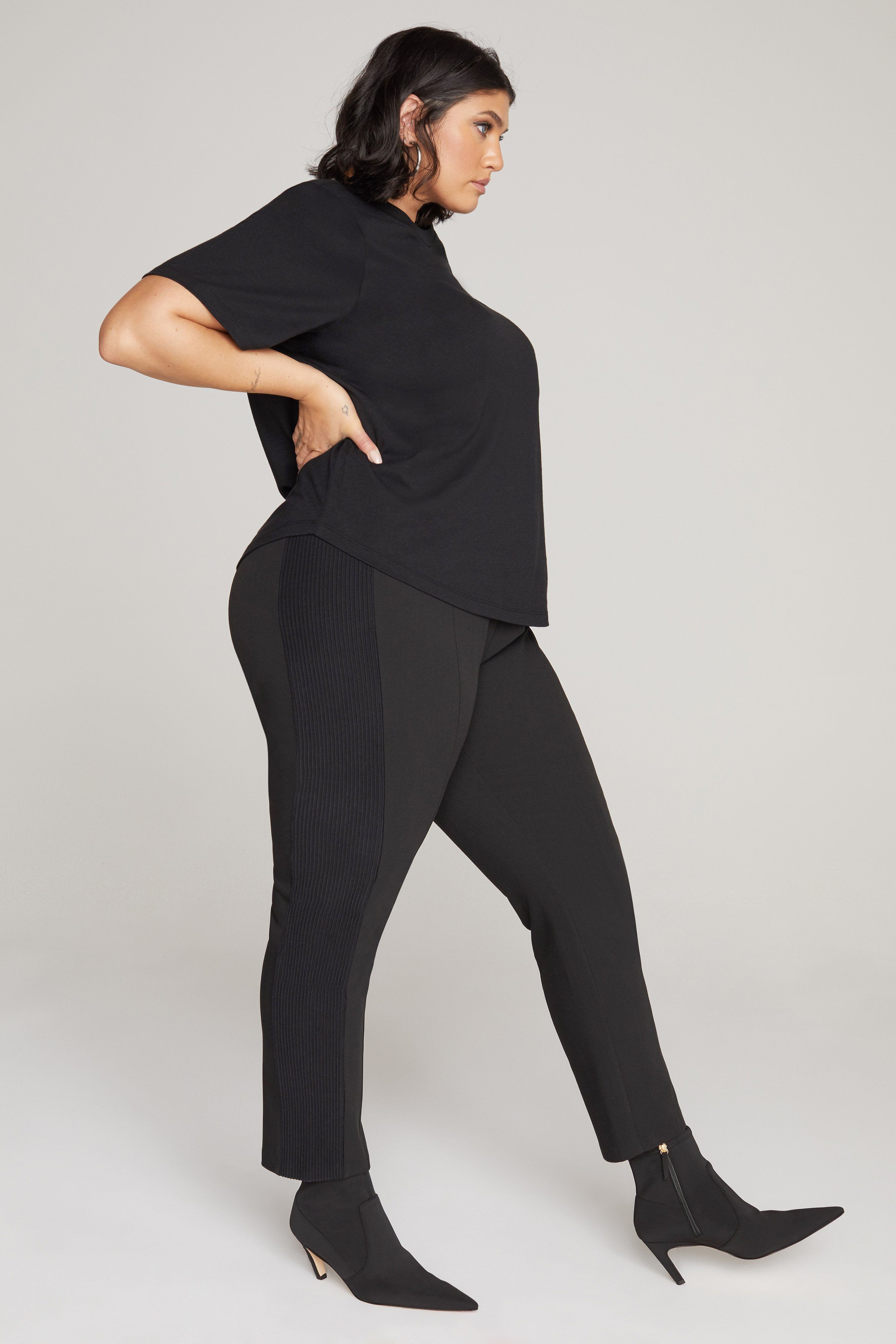 ICON BOOTIE 75 in NEOPRENE BLACK001 styled with our THE CROP BOY TEE in BLACK001, POWER SHOULDER BODY in BLACK001, or SLEEK AND SCULPTING PANT in BLACK001
