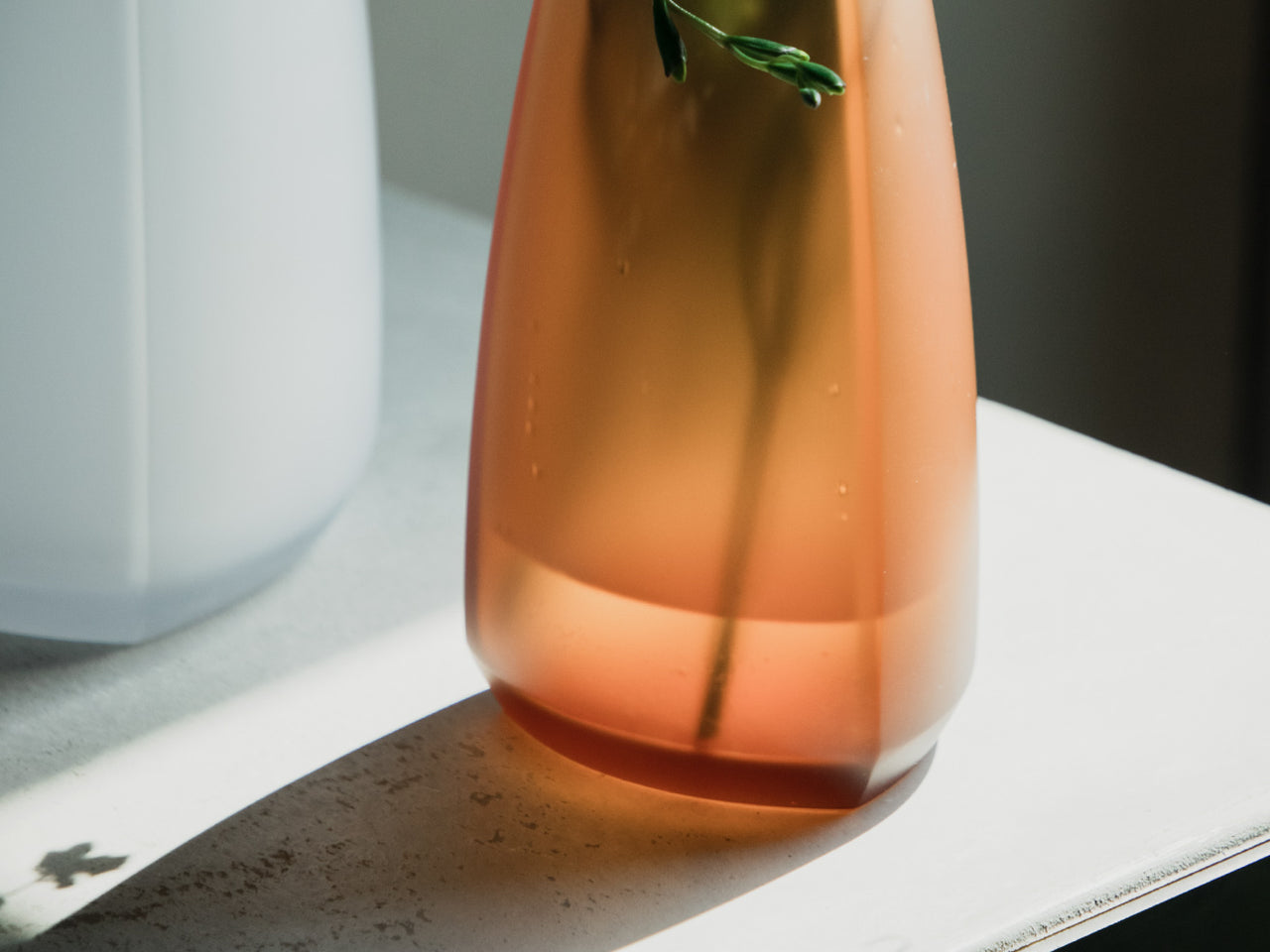  Close-up of the base of a TRE vase in the Amber colourway 